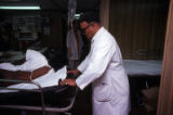 Patient being transported within a prison hospital