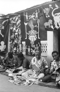 Appliqué workers, in street, Abomey, Benin