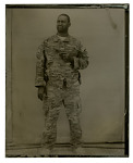 U.S. Soldier holding hand-gun