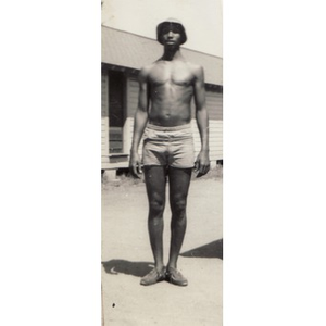 Franklin Gordon poses in front of cabin at Breezy Meadows Camp