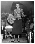 Model posing in outfit at the 20th Century Fashion Show