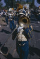 Member of the Booker T. Washington High School marching band playing the trombone during a homecoming parade in Montgomery, Alabama.