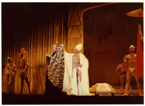 Performance picture of four men and two women; Eartha Kitt is in a white turban]. [color photoprint