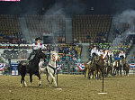 Members of the Westernaires, a Jefferson County, Colorado, organization that teaches and employs Roman-style riding (a rider standing atop two galloping horses) perform at the Martin Luther King, Jr., African-American Heritage Rodeo, one of the National Western Stock Show events in Denver, Colorado