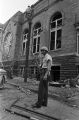 Police officer standing outside of 16th Street Baptist Church in Birmingham, Alabama, after the building was bombed.