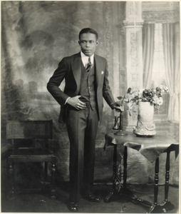 Studio Portrait of Young Man with Telephone