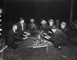 Striking miners sitting around a fire at Woodward Mines in Birmingham, Alabama.