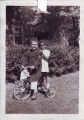 Russell Cohen and Normajo Moore on Tricycle, ca. 1945