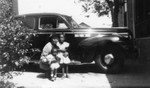 Family in a driveway