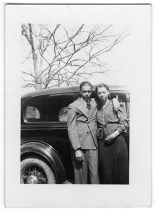 Portrait of an Unidentified Man and Woman in Front of a Car