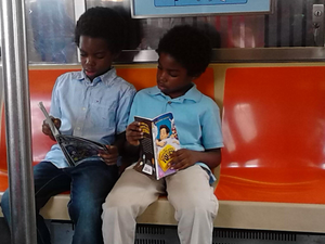 Two children on the Franklin Avenue Shuttle