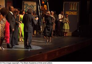 Curtis King, Erykah Badu, and Dereque Whiturs on Stage with Performers