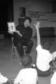 A Marquette student reads to a group of kids at Milwaukee Urban Day School, 1995