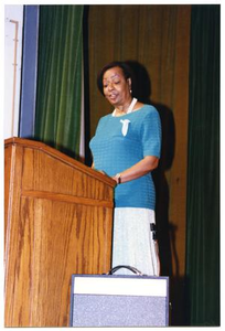 Woman Giving Speech at Health Fair