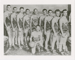 Group portrait of the Buffalo Bisons basketball team, with Pop Gates standing at center