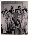 Photograph of Lionel Hampton with members of the Moulin Rouge show group, 1955