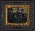 [Unidentified infantry sergeant in Union uniform with five young infantry soldiers with American flag at side]