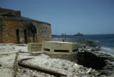 Senegal, detail of fortress on Gorée Island with ships in background