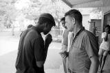 Willie Smith and Harold Pugh on the porch of Pugh's Superette on Foster Street in Newtown, a neighborhood in Montgomery, Alabama.