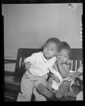 Ocia Mae Miles and brother Herman at hospital after eating some "strange bluish powder" in Los Angeles, Calif., 1949