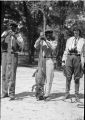 African-American Men Pose With American Alligators