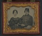 [Unidentified soldier in Union uniform with unidentified woman in dress]