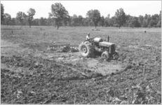 African-American man on tractor 2