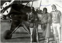 Chauncy E. Spencer, his mother Anne Spencer, and Dale L. White standing next to the bi-plane flown cross county, at Preston Glenn Airport, Lynchburg, VA, 1939