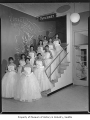 Young women in gowns at Rhinestone Christmas Ball, Seattle, 1956