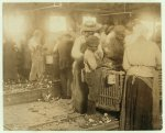 One of the smallest negro oyster shuckers that I found on the Atlantic Coast. Usually they do not work the negro children. Varn &amp; Platt Canning Co.  Location: Bluffton, South Carolina.