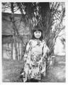 Hiro, girl from Japan, standing in the Japanese garden