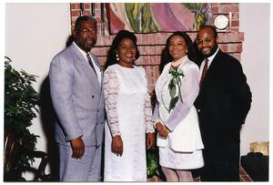 Links, Inc. Members and Two Men in Front of Fireplace