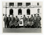 Group portrait of Ramsey County sheriffs in front of squad car, St. Paul.