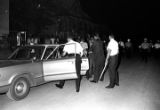 Police officers arresting Jacques Bradley and Richard Boone during a civil rights demonstration in Montgomery, Alabama.