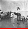 Woman performing with drum