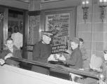 Member of the Salvation Army collecting cans of food during a children's movie at the Paramount Theatre at 249 Montgomery Street in downtown Montgomery, Alabama.