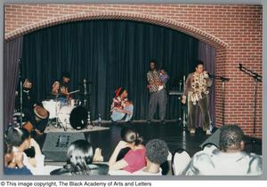 Photograph of performers onstage