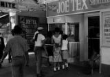 People in line to get concert tickets at a box office in Harlem.