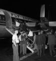 Freedom Riders boarding an Eastern Air Lines flight to New Orleans at the airport in Birmingham, Alabama.