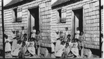 A Negro family beside their cabin. S. Carolina