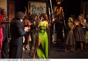 Curtis King, Erykah Badu, and Dereque Whiturs on Stage with Performers