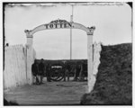 [District of Columbia. Men and gun of 3d Massachusetts Heavy Artillery at ornamental gate of Fort Totten]