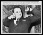 [Sen. Robert Byrd, half-length portrait, arms in air stretching at the conclusion of his 21 hour 8 minute civil rights filibuster in the Senate]