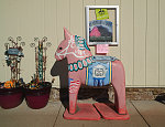 A dala horse outside a shop in Scandia, Minnesota, a small community on the site of the state's first Swedish settlements (among what would be hundreds to which Scandinavians emigrated in the mid-1800s). Dala horses are quintessential Swedish decorative handicrafts that trace to the Swedish province of Darlana