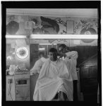 [African-American man getting haircut in Livingston's Barber Shop, East Side, Buffalo, New York]