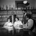 Group planning for a reunion in the library at the Most Pure Heart of Mary School on Sengstak Street in Mobile, Alabama.