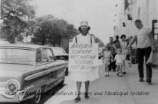 Woman Pickets Bargain Corner Store