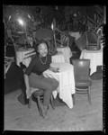 Thumbnail for Singer Eartha Kitt, seated in empty nightclub in Los Angeles, Calif., 1953