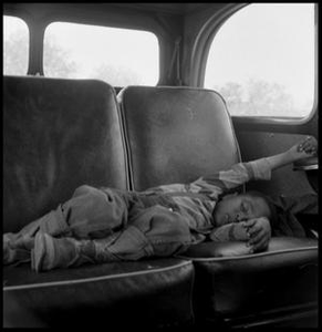 Child Sleeping in a Car