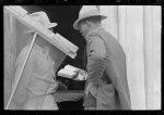 Negro Preacher reading the scriptures to Negro man, San Antonio, Texas